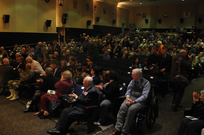 Korean-era veterans receive a round of applause after standing to get recognized by peers and younger generations during the Korean-era Veterans' Salute ceremony at Joint Base Lewis-McChord, Wash., Nov. 13.