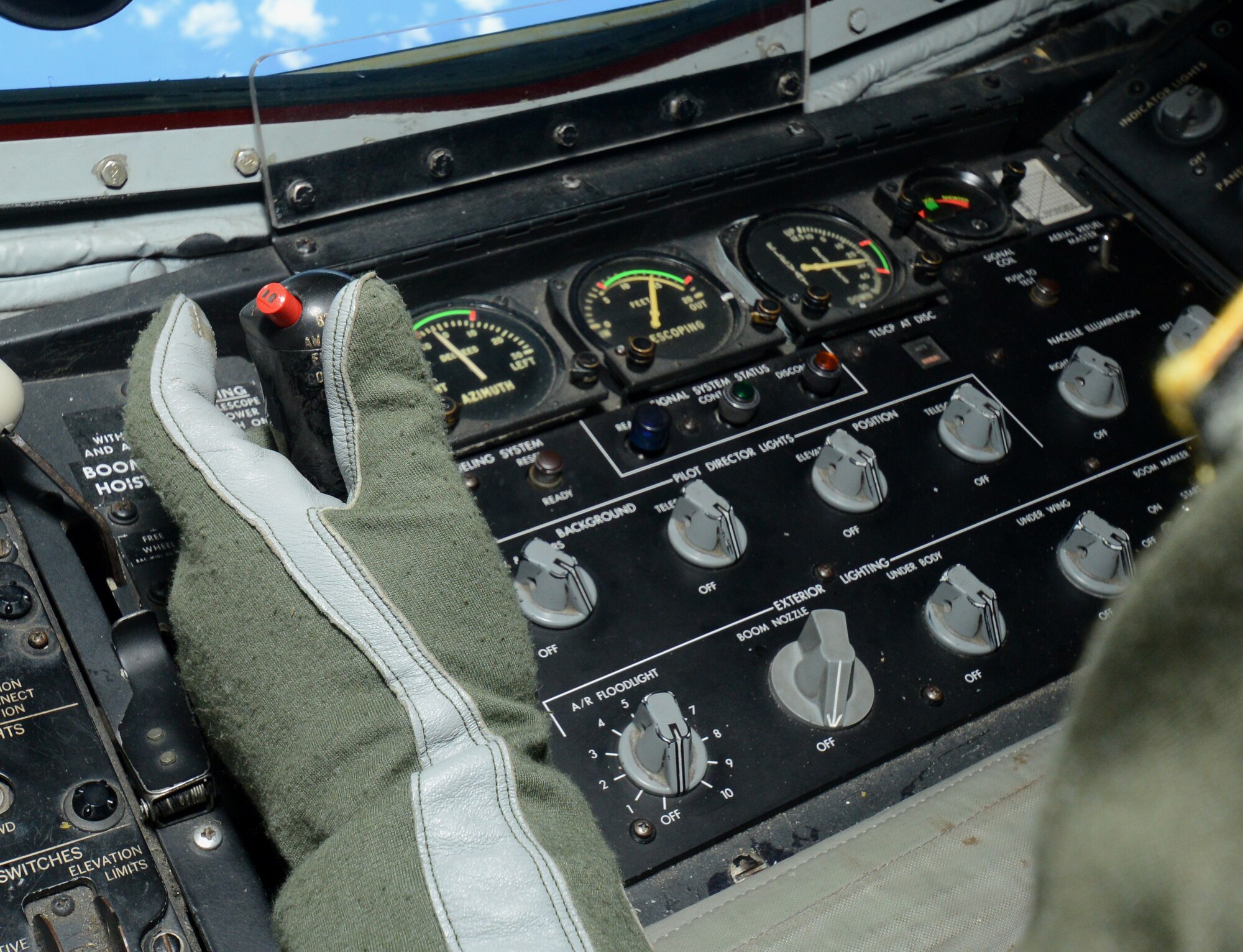 Tech. Sgt. Adam Boeckman, 190th Air Refueling Wing KC-135 boom operator executes an aerial refueling mission Nov. 6, 2015, near Andersen Air Force Base, Guam. The KC-135 Stratotanker from Kansas refueled a B-52 Stratofortress assigned to Minot Air Force Base, N.D. (U.S. Air Force photo by Airman 1st Class Arielle Vasquez/Released)