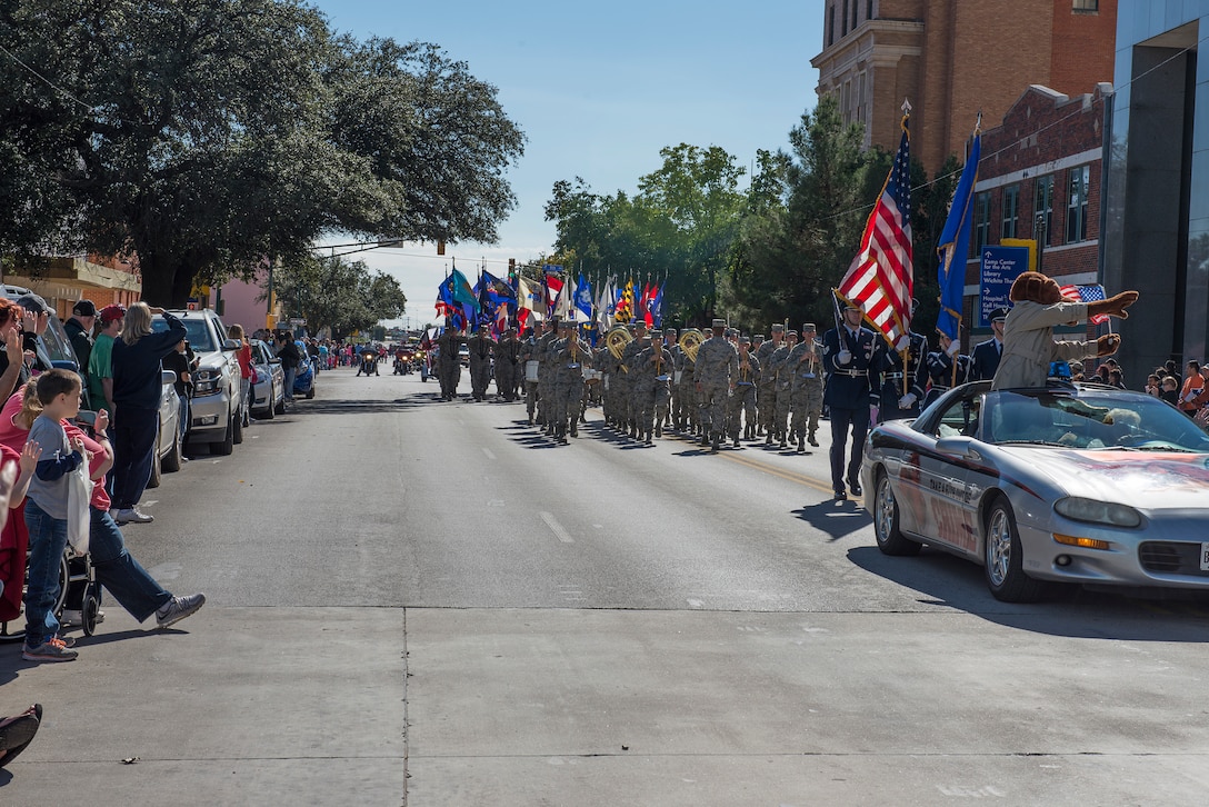 Airmen march in Veterans Day parade