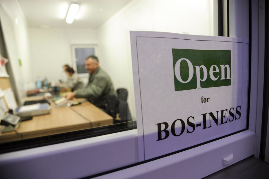 An open sign is displayed on the 74th Expeditionary Fighter Squadron Base Operations Support-Integrating’s office window at Amari Air Base, Estonia, Nov. 3, 2015. The 74th EFS BOS-I team is made up of fifty-three Airmen from 18 different Air Force specialty codes who are deployed as part of a theater security package in support of Operation Atlantic Resolve.  (U.S. Air Force photo by Andrea Jenkins/Released)