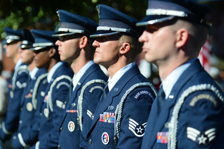 U.S. Airmen assigned to the 20th Force Support Squadron honor guard stand at a Veterans Day ceremony held in Sumter, S.C., Nov. 11, 2015. After the parade, veterans and supporters gathered on the front lawn of the Sumter Courthouse for a ceremony dedicated to veterans. (U.S. Air Force photo by Airman 1st Class Kelsey Tucker)