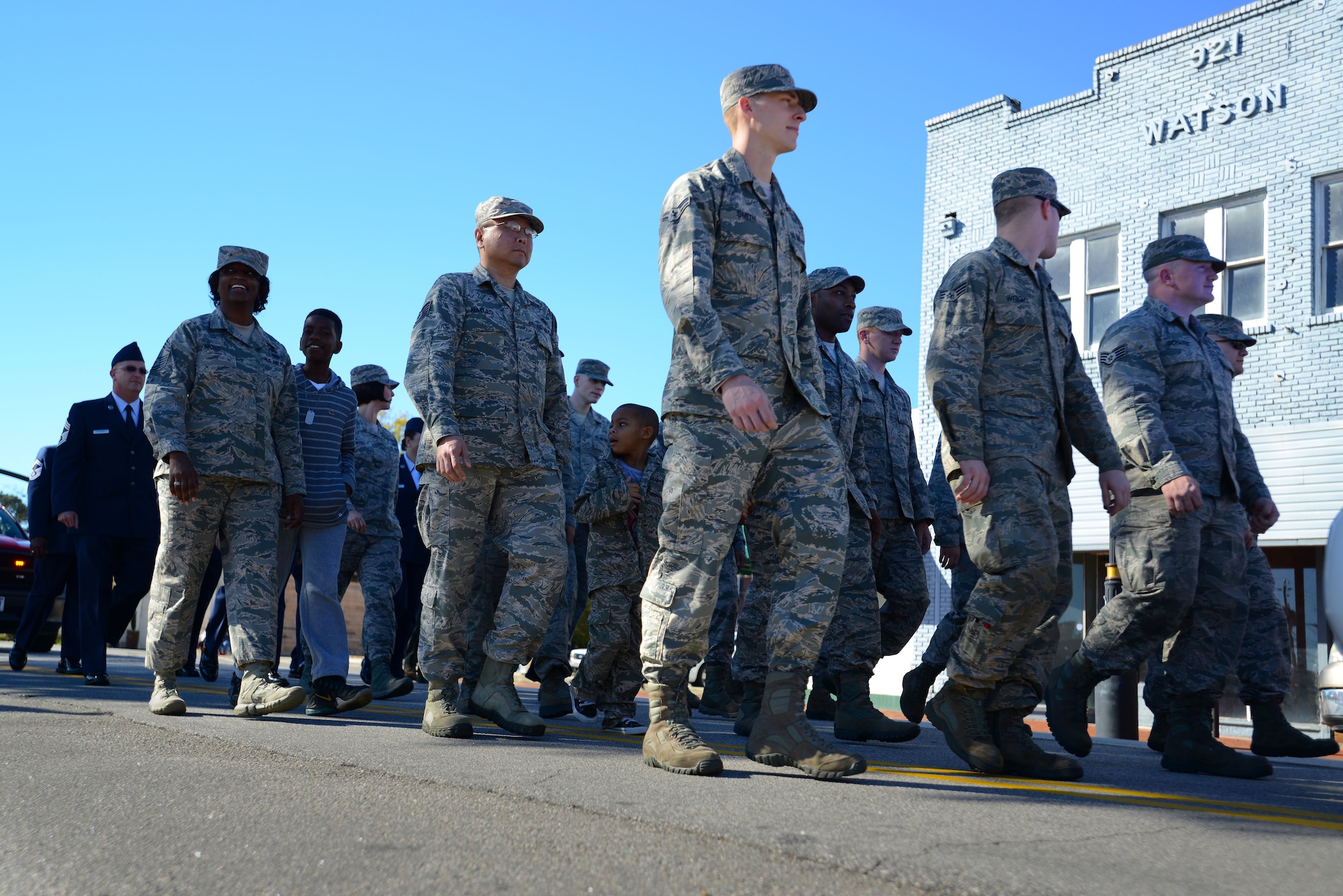 Members of Team Shaw participate in a Veterans Day parade in downtown Sumter, S.C., Nov. 11, 2015. Following the parade, Chief Master Sgt. Christopher McKinney, 20th Fighter Wing command chief, gave a speech to the gathered crowd. (U.S. Air Force photo by Airman 1st Class Kelsey Tucker)