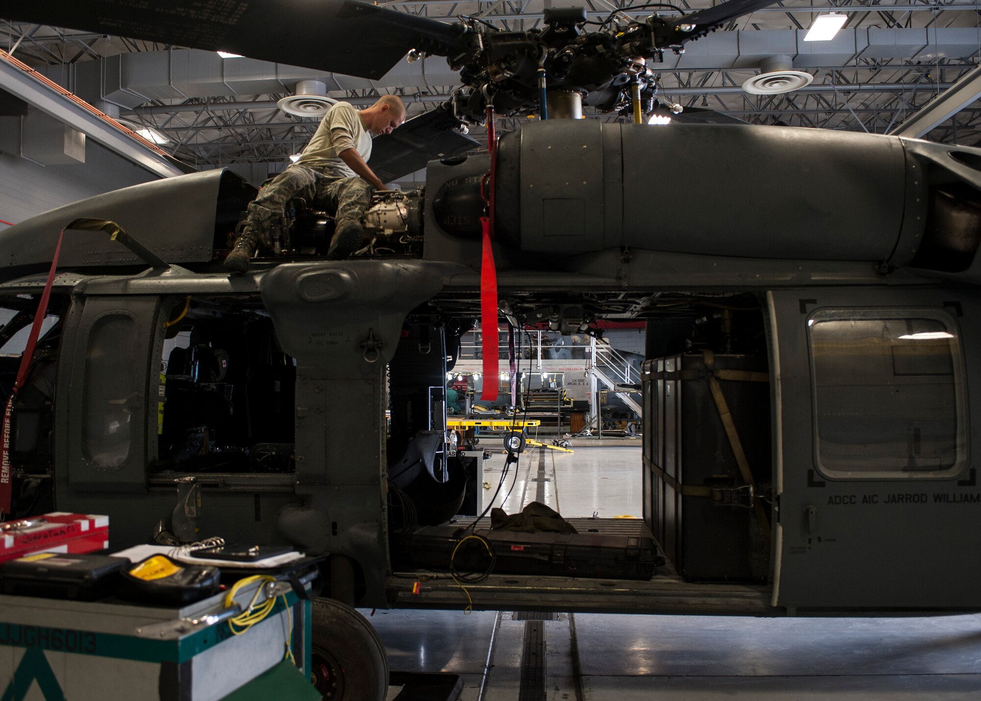 Senior Airman Jacob Crain, 823rd Maintenance Squadron crew chief, performs a torque check on a main gear box on an HH-60G Pave Hawk at Nellis Air Force Base, Nev., Nov. 10, 2015. Airmen at the 823rd MXS are capable of performing intermediate, organizational and depot level maintenance on HH-60 helicopters. (U.S. Air Force photo by Staff Sgt. Siuta B. Ika)