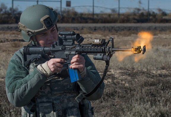 Airman 1st Class Alexis Dinger, 366th Security Forces Squadron response force leader, fires her final rounds to clear her weapon during Gunfighter Flag 16-1 Nov. 6, 2015, at Mountain Home Air Force Base, Idaho. At the end of an exercise, security forces members expend extra rounds rather than saving them to promote easy accountability and avoid storage of expired ammunition. (U.S. Air Force photo by Airman Chester Mientkiewicz/RELEASED)
