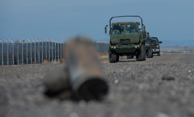 A 366th Security Forces Squadron 5-ton truck approaches a simulated improvised explosive device during Gunfighter Flag 16-1 Nov. 6, 2015, at Mountain Home Air Force Base, Idaho. IEDs are one of the primary threats deployed airmen face with more than 26,000 IED events causing approximately 55,000 casualties worldwide 2014 alone, according to Army officials. (U.S. Air Force photo by Airman Chester Mientkiewicz/RELEASED)
