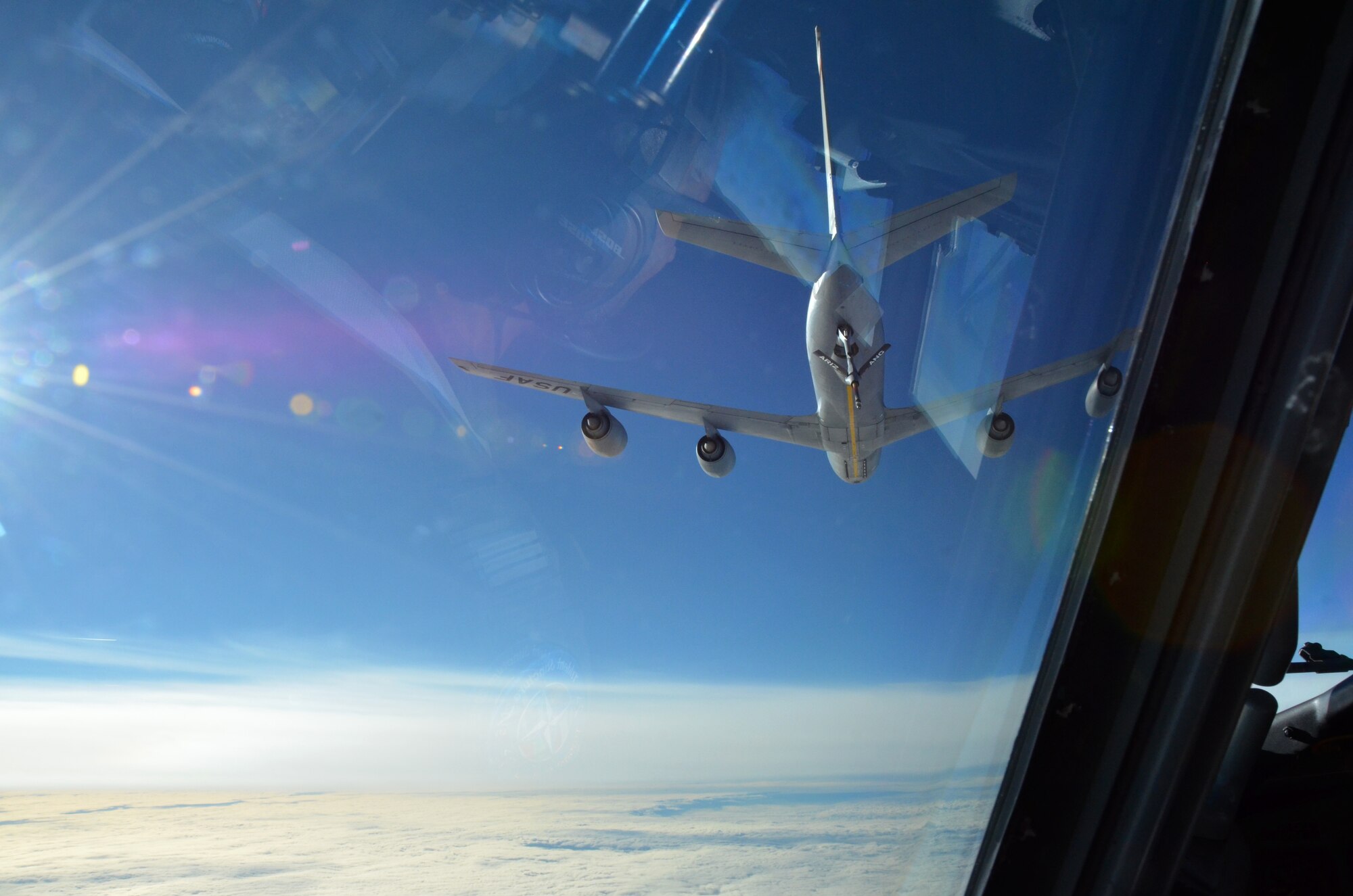 Mission accomplished. An Arizona Air National Guard KC-135 Stratotanker finishes refueling a NATO E-3A Sentry over northern Germany during a training mission Nov. 16. Airmen from the 161st Air Refueling Wing based in Phoenix are supporting aircrew training operations Nov. 9-20 at NATO Air Base Geilenkirchen, Germany. (U.S. Air National Guard photo by Lt. Col. Gabe Johnson)
