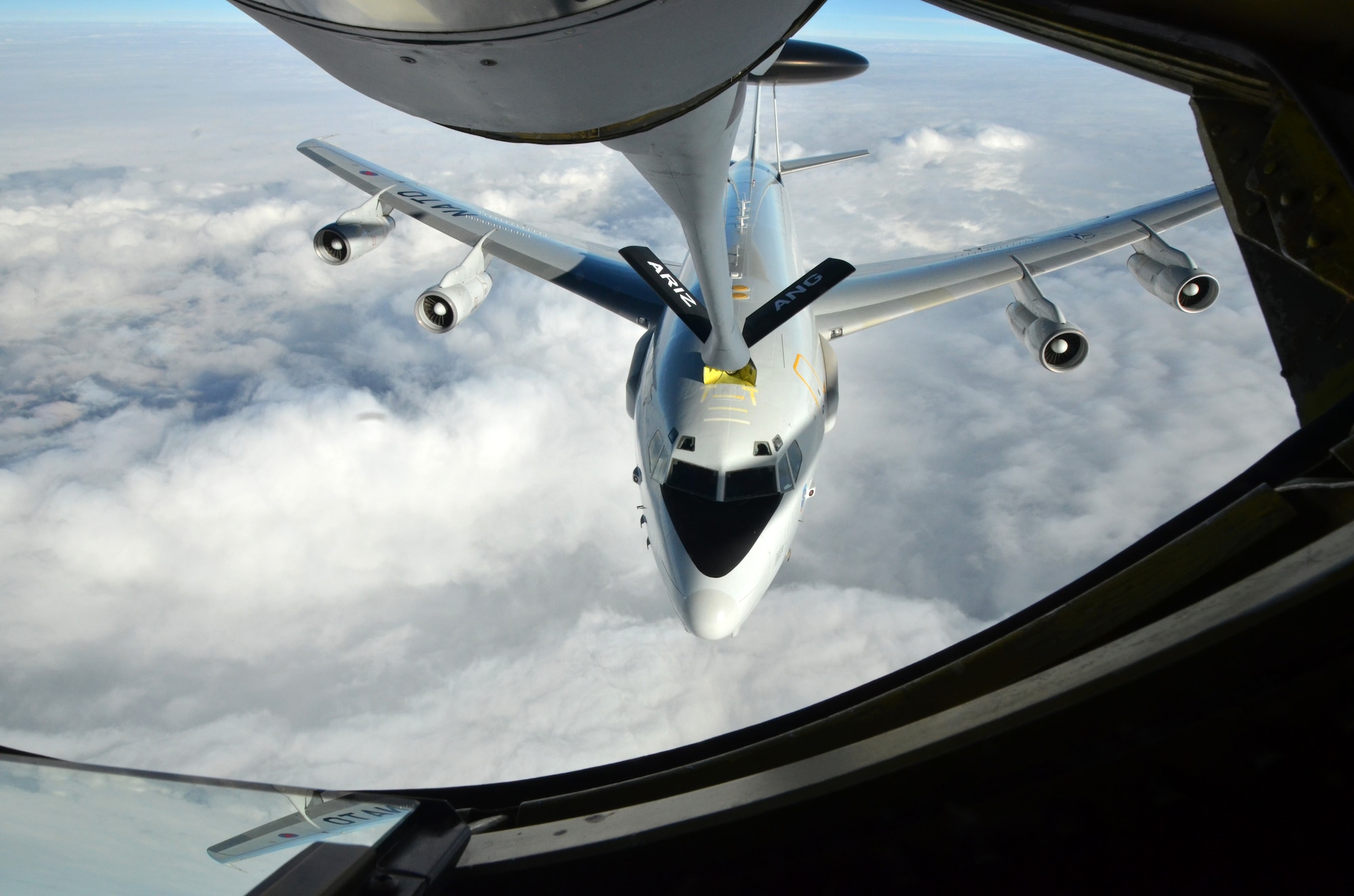 NATO E-3A Sentry takes on fuel from an Arizona Air National Guard KC-135 Stratotanker over northern Germany during a training mission, Nov. 10. Airmen from the 161st Air Refueling Wing based in Phoenix are supporting aircrew training operations Nov. 9-20 at NATO Air Base Geilenkirchen, Germany. (U.S. Air National Guard photo by Lt. Col. Gabe Johnson)