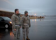 Col. Matthew Fritz, Vice Commander of the 92nd ARW and Col. Bruce Heseltine, Vice Commander of the 22nd Air Refueling Wing, wait to welcome McConnell aircrew to Fairchild Air Force base as part of Global Thunder Nov. 2 - 8, 2015 Fairchild AFB, Wash. The 22nd ARW teamed up with the 92nd ARW and used their day to day mission capabilities of air refueling to enable USSSTRATCOM to conduct global combat and reconnaissance operations. (U.S. Air Force photo by 2nd Lt Krystal Jimenez)