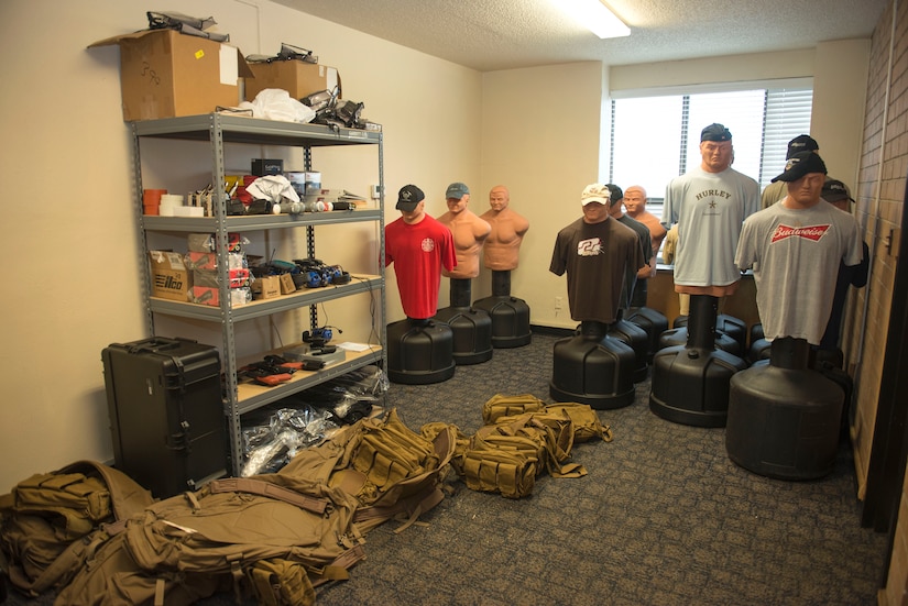 To prepare for the active shooter training exercise, the law enforcement officers have to pick up their required gear in the supply rooms at the Federal Law Enforcement Training Center in Charleston, S.C., on Nov. 5, 2015. The gear contains a prop firearm that shoots blanks, eye protection goggles, hearing protection and a helmet with a GoPro attached on top so they can visually see how they did at the exercise for themselves. (U.S. Air Force photo/Airman 1st Class Thomas T. Charlton)