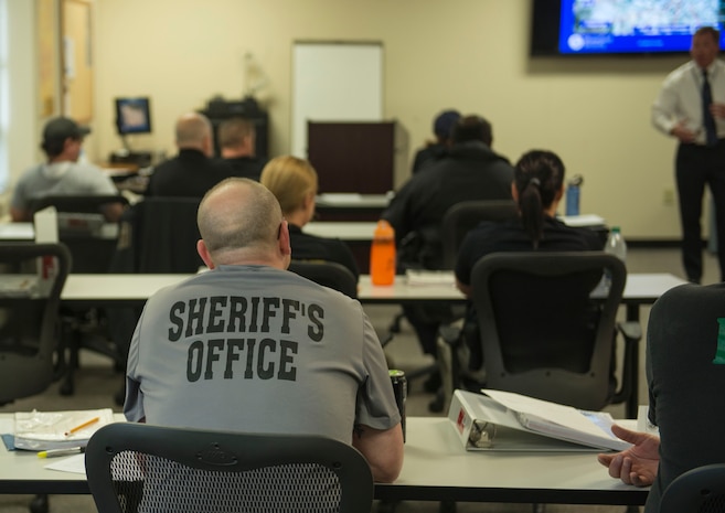 Law enforcement officers start orientation at the Federal Law Enforcement Training Center in Charleston, S.C., on Nov. 3, 2015 prior to an active shooter training exercise. The active shooter program is a four day course to help law enforcement officers better handle an actual active shooter situation. (U.S. Air Force photo/Airman 1st Class Thomas T. Charlton) 