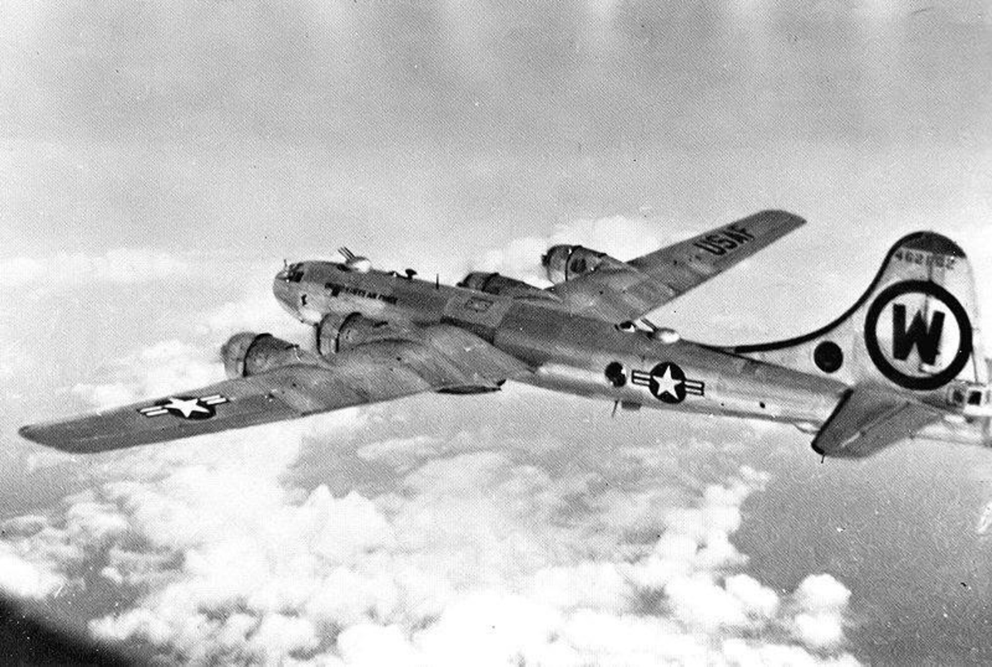Boeing B-29A Superfortress “Wright’s Delight,” tail 44-62102, flies over the Sea of Japan enroute to Korea for a bombing mission in July 1950. The Circle W indicates the aircraft is assigned to the 92nd Bombardment Group. (Courtesy photo)