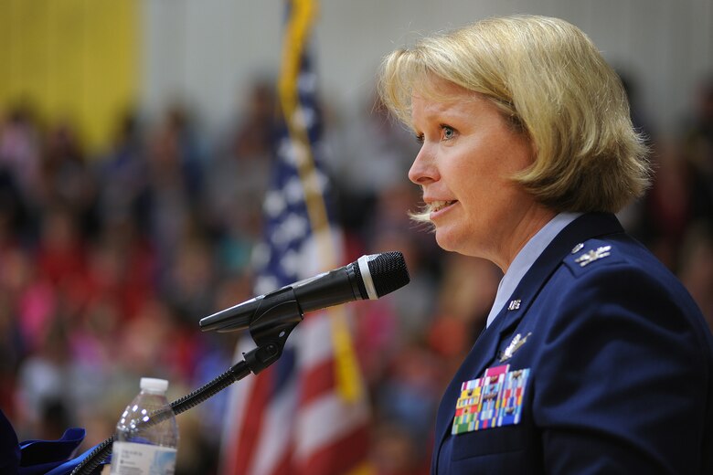 Col. DeAnna M. Burt, 50th Space Wing commander, addresses students and guests during a Veterans Day recognition ceremony at Ellicott High School in Ellicott, Colorado, Wednesday, Nov. 11, 2015. The school hosts the annual ceremony to honor community veterans.  (U.S Air Force Photo/Dennis Rogers)