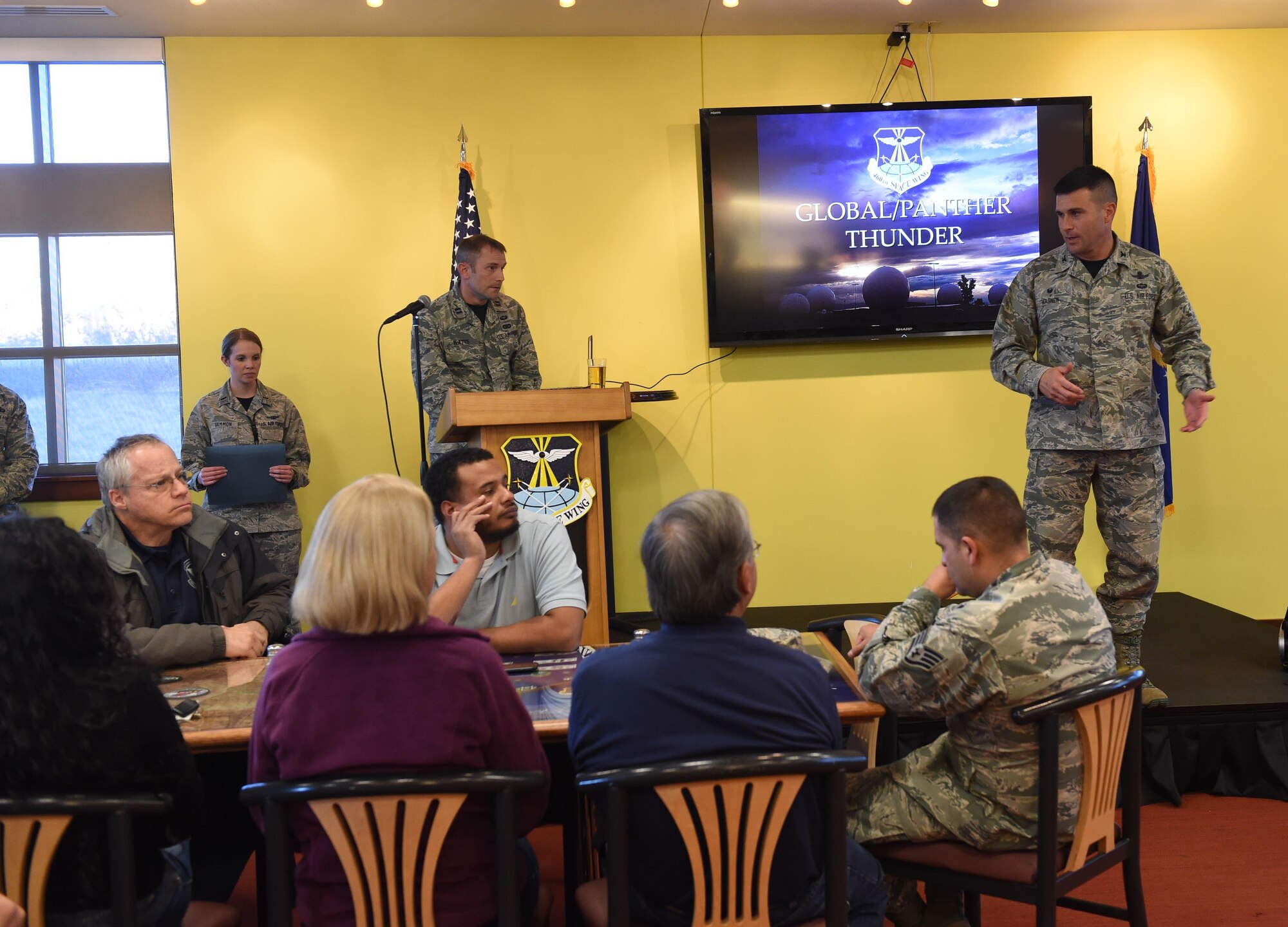 Col. John Wager, 460th Space Wing commander, speaks to Team Buckley members during an end of exercise celebration Nov. 13, 2015, at Panther Den on Buckley Air Force Base, Colo. Certificates were awarded to top performers for their efforts during Panther Thunder, Buckley AFB’s version of the Strategic Command exercise, Global Thunder. (U.S. Air Force photo by Airman 1st Class Samantha Meadors/Released)