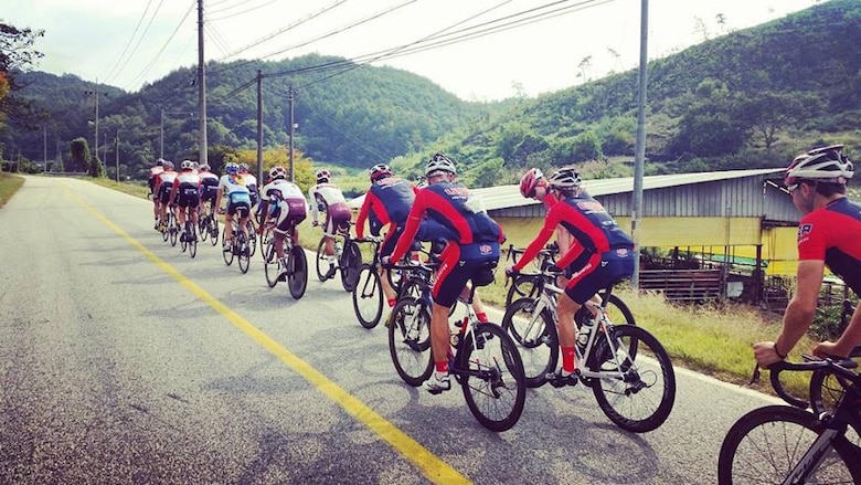 MUNGYEONG, SOUTH KOREA – Riders of the U.S. Armed Forces cycling team join their counterparts from other countries on a training ride near Mungyeong, South Korea during the sixth Conseil International du Sport Militaire military sports world championships Oct. 2-11, 2015. The men’s team finished ninth in the 131 kilometer road race.