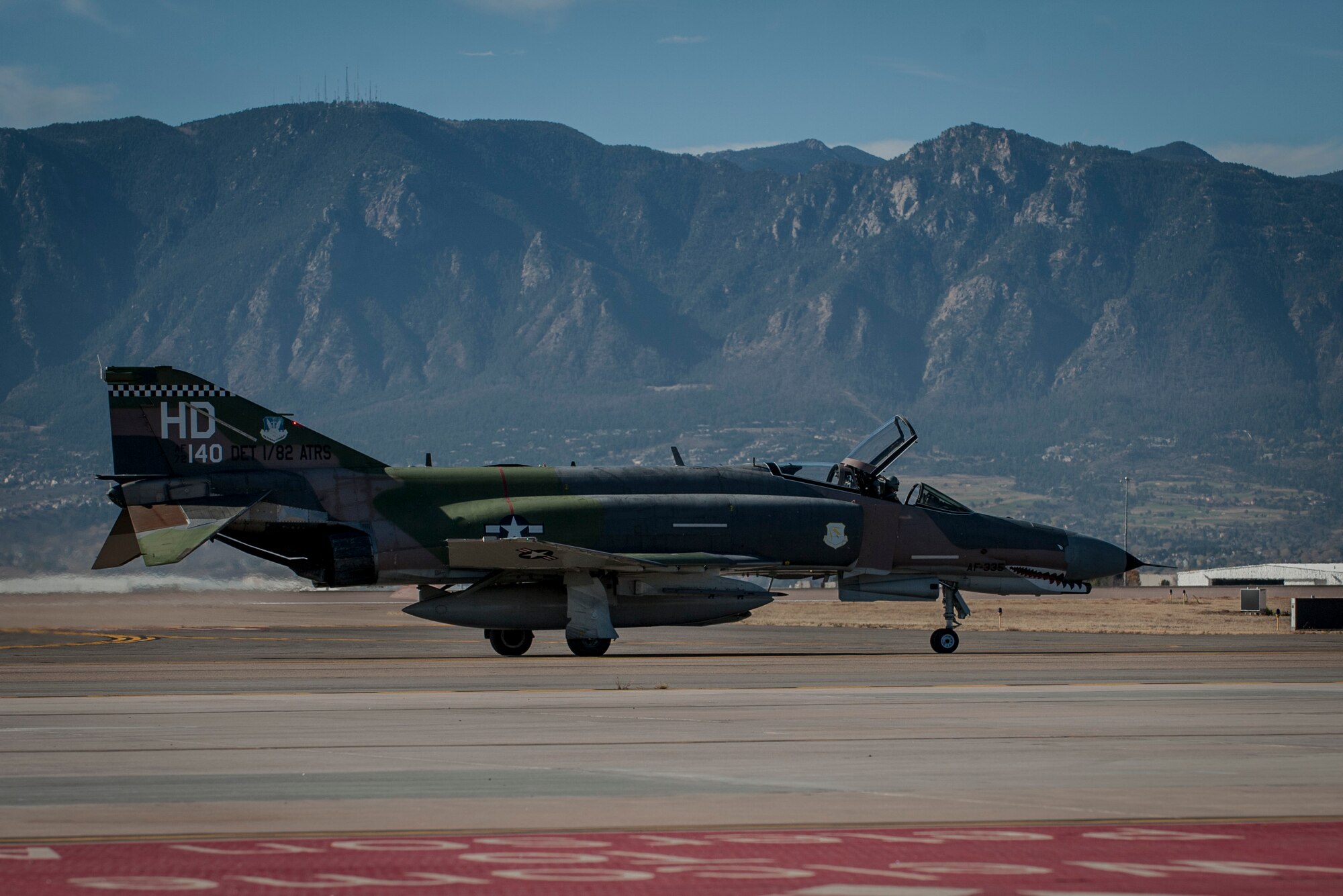 PETERSON AIR FORCE BASE, Colo. – An F-4 Phantom II taxis down the apron at Peterson Air Force Base as it prepares to take off for its home base of Holloman AFB, N.M., Nov. 9, 2015. Two F-4s and two F-22 Raptors were in Colorado to perform a flyover at the Air Force versus Army football game at the Air Force Academy’s Falcon Stadium on Nov. 7, 2015. (U.S. Air Force photo by Senior Airmen Rose Gudex)