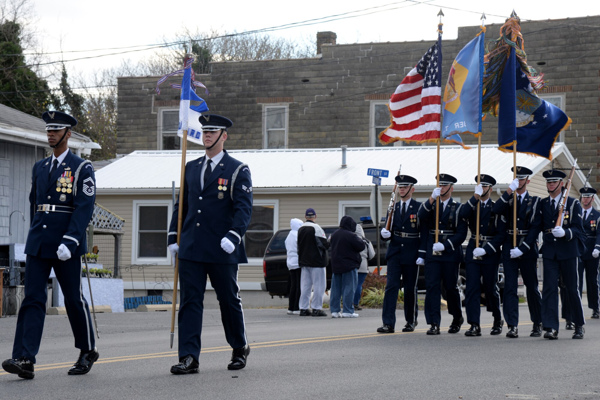 The U.S. Air Force Honor Guard parade element marches in the 3rd Annual Eastern Shore Veterans Day Parade in downtown Laurel, DE., Nov. 14, 2015. Participants in the parade are there to show their support for those who have served and are currently serving in the U.S. Armed Forces. (U.S. Air Force photo/ Staff Sgt. Matt Davis)