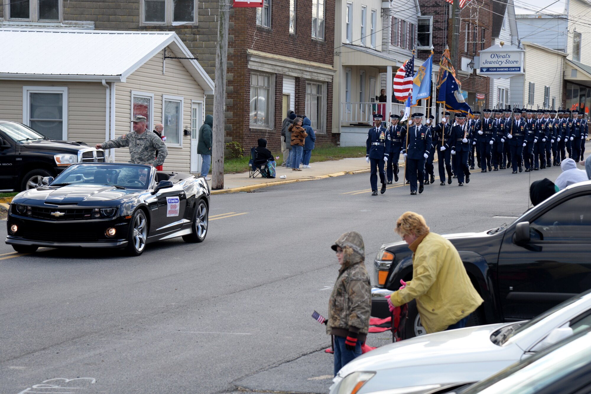 The U.S. Air Force Honor Guard parade element marches in the 3rd Annual Eastern Shore Veterans Day Parade in downtown Laurel, DE., Nov. 14, 2015. Participants in the parade are there to show their support for those who have served and are currently serving in the U.S. Armed Forces. (U.S. Air Force photo/ Staff Sgt. Matt Davis)