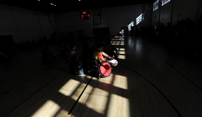 Wounded warriors practice wheelchair rugby during the Northeast Region Warrior CARE Event at Joint Base Andrews, Md., Nov. 16. The event is in conjunction with Warrior Care Month, a month dedicated to honoring the courage, resilience and accomplishments of wounded, ill and injured service members, their families and their caregivers. (U.S. Air Force Photo/Tech. Sgt. Brian Ferguson)