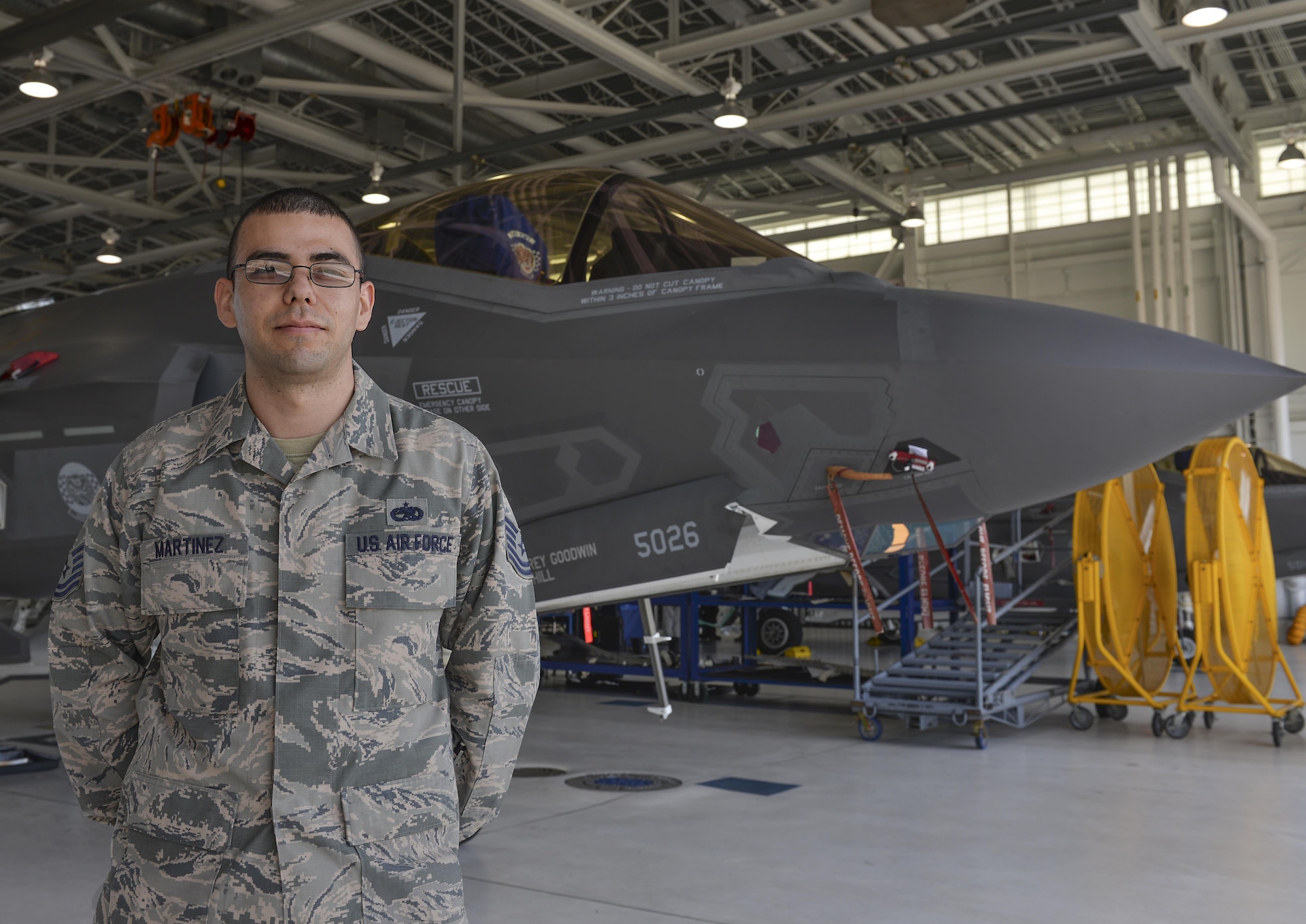 Tech. Sgt. Vicente Martinez, 33rd Aircraft Maintenance Squadron training monitor, stands with the F-35A Lightning II at Eglin Air Force Base, Fla., Oct. 8. As a veteran crew chief of 10 years, Martinez transferred from F-16 Fighting Falcons to the F-35. (U.S. Air Force Photo/Senior Airman Andrea Posey)