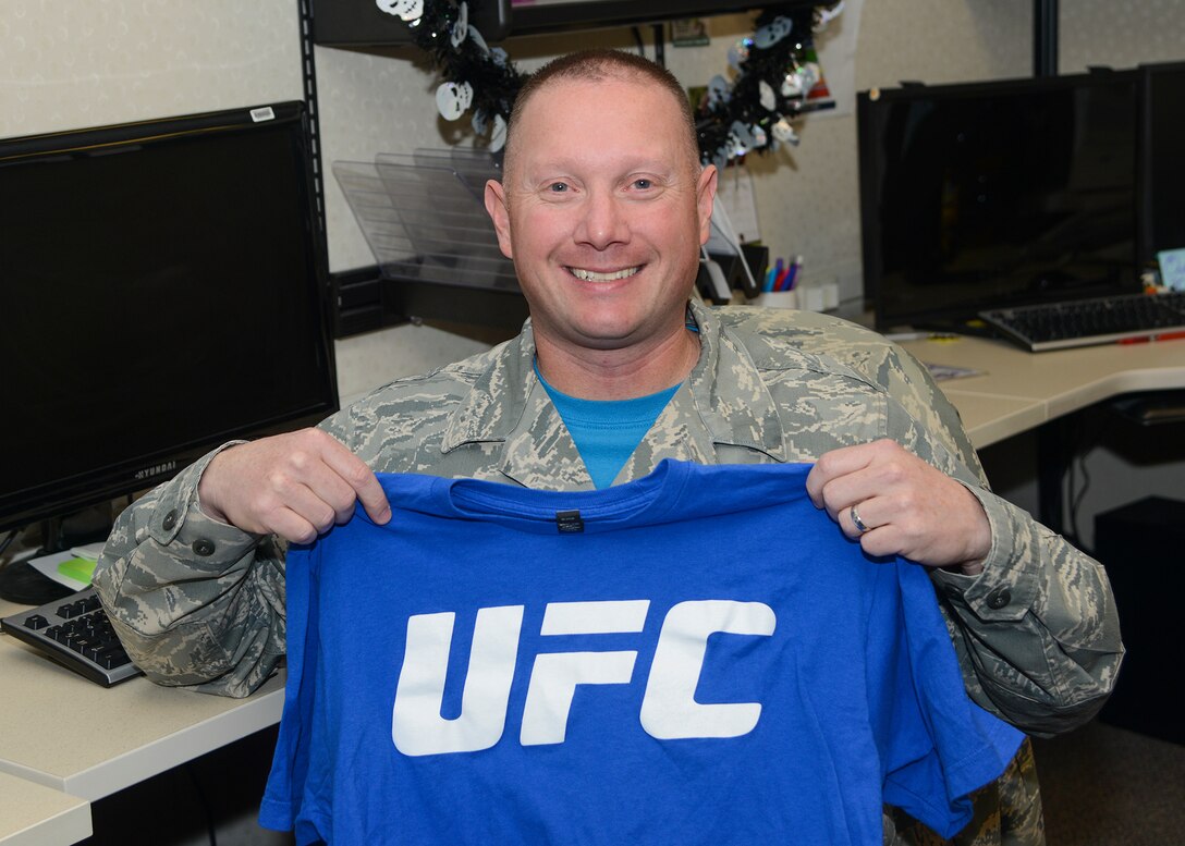 Tech. Sgt. Ryan Singer, Air Force Operational Test and Evaluation Center Detachment 1,  is the winner of the Air Force Clubs UFC Fight Frenzy prize drawing to attend the Ultimate Fighting Championship Experience in Las Vegas with his wife, Tara. (U.S. Air Force photo by Rebecca Amber)