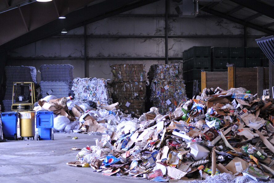 Recycled cardboard material is piled up inside the Civil Engineering Recycling Center located in Area A, Bldg. 293. America Recycles Day on Nov. 15 will help to promote recycling and the center will host an open house from 8 a.m. to 3 p.m. (U.S. Air Force photo/Mary H. Allen) 