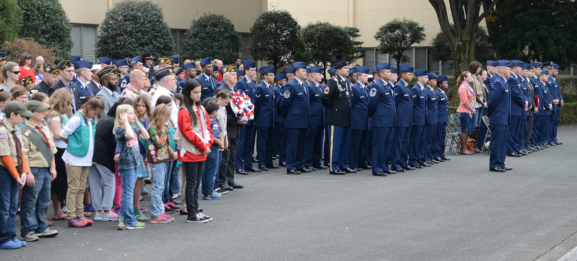 Members of Team Yokota attend a Veterans Day ceremony at Yokota Air Base, Japan, Nov. 11, 2015. Veterans Day celebrates the service of all U.S. military veterans and coincides with Armistice Day and Remembrance Day which are celebrated in other countries, marking the anniversary of the end of World War I. (U.S. Air Force photo by Senior Airman David C. Danford/Released)