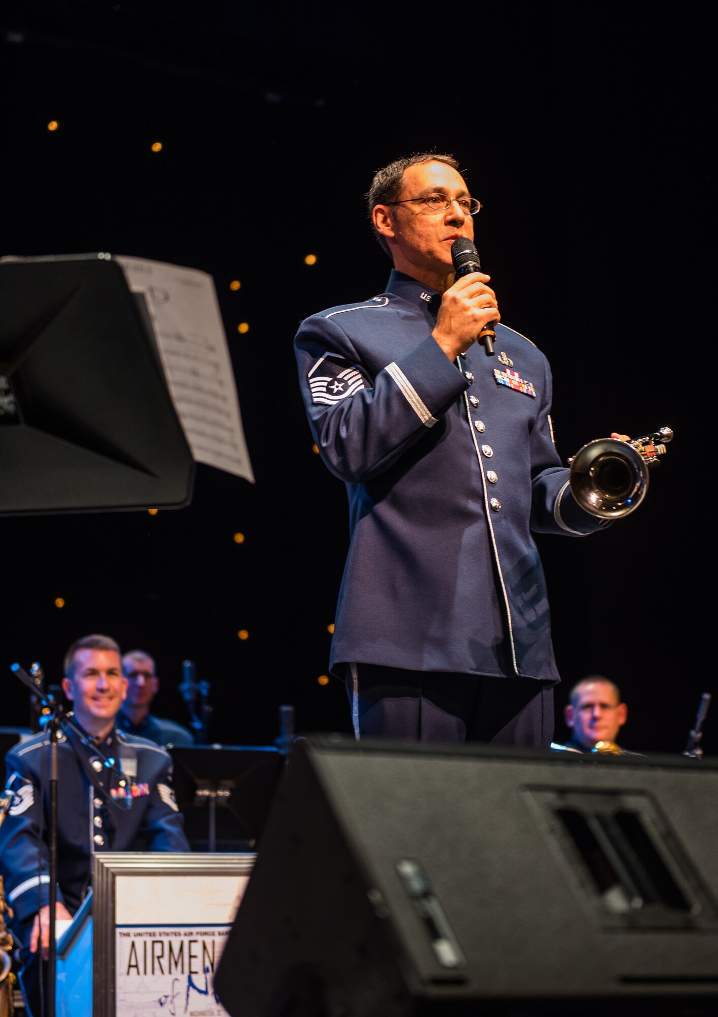 Master Sgt. Alan Baylock addresses the audience during a concert on his final tour with the Airmen of Note in Johnstown, Pa. (Air Force Photo/released).
