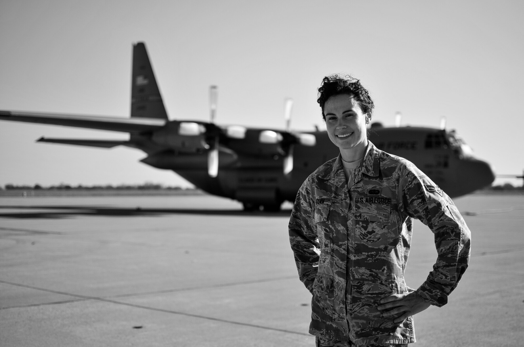 U.S. Air Force Airman 1st Class Tanya L. Brown, a services journeyman with the 182nd Force Support Squadron, Illinois Air National Guard, poses on the 182nd Airlift Wing aircraft apron in Peoria, Ill., Nov. 7, 2015. Brown – a full-time beautician, farmer, student, wife and mother - enlisted in the Air National Guard at the age of 35. (U.S. Air National Guard photo by Staff Sgt. Lealan Buehrer/Released)