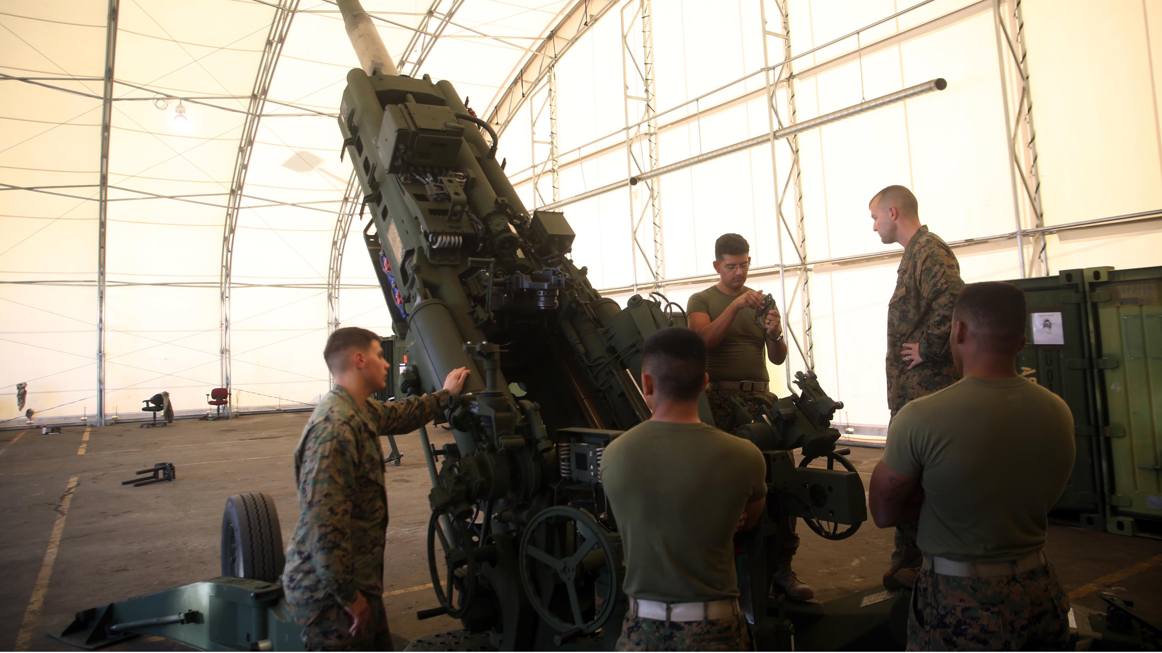 Field artillery cannoneers train, proficient gunners > The