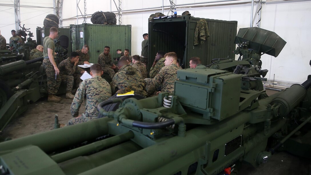 Marines with 10th Marine Regiment take part in a lesson on a M777A2 Howitzer during the Artillery Assistant Gunners and Gunners Course Nov. 6, 2015, at Marine Corps Base Camp Lejeune, N.C. The month-long course trains Marines to transition from basic field artillery cannoneers to assistant gunners and gunners within their gun sections. 