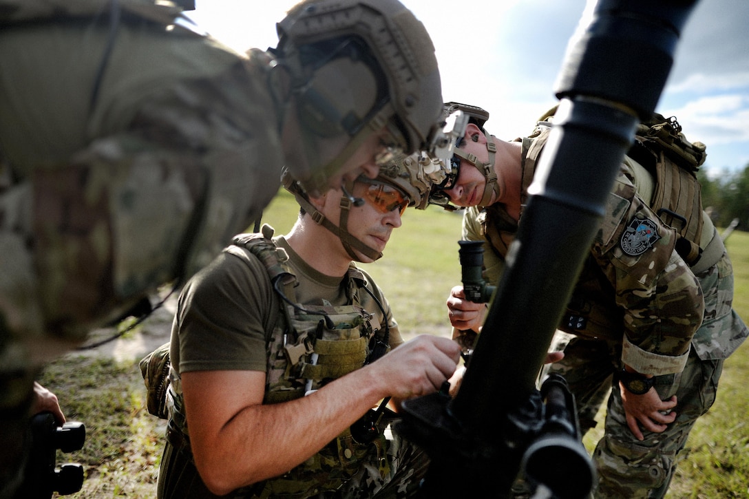 Army Green Berets set up a mortar system during exercise Southern Strike 16 on Camp Shelby Joint Forces Training Center, Miss., Nov. 4, 2015. The Green Berets are assigned to Company C, 2nd Battalion, 20th Special Forces Group. The exercise emphasizes air-to-air, air-to-ground, and special operations forces training opportunities. New York Air National Guard photo by Staff Sgt. Christopher S. Muncy