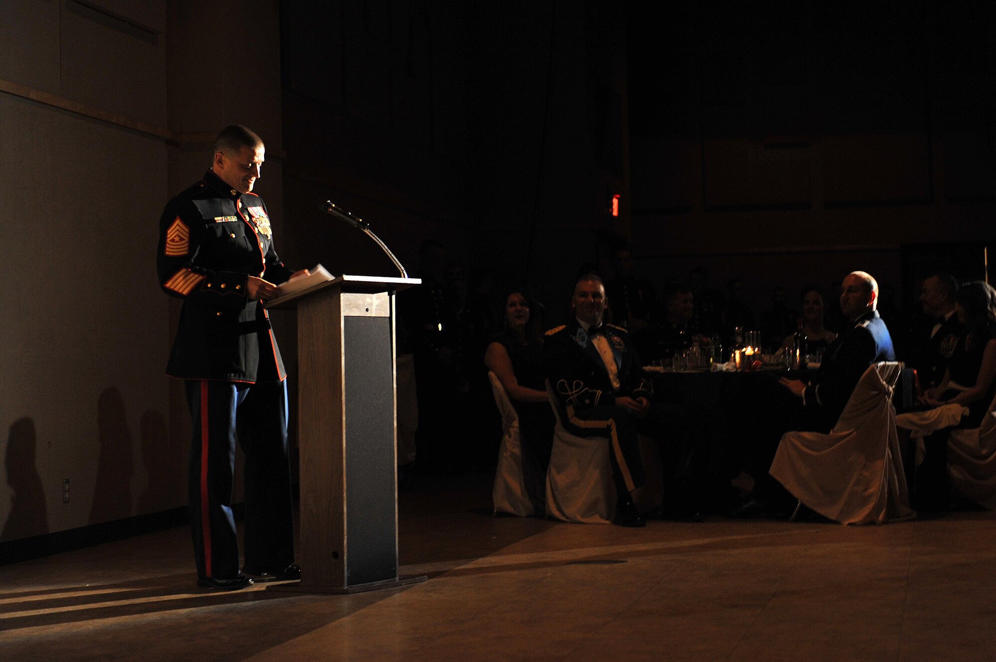 Retired U.S. Marine Corps Sgt. Maj. Christopher G. Combs, Marine Corps Ball guest of honor, delivers his speech during the Unites States Marine Corps Ball at the McNease Convention Center, San Angelo, Texas, Nov. 14, 2015. Combs retired with 22 years of service and he currently runs the Jr. ROTC program for College Park High School, The Woodlands, Texas. (U.S. Air Force photo by Airman 1st Class Caelynn Ferguson/Released)
