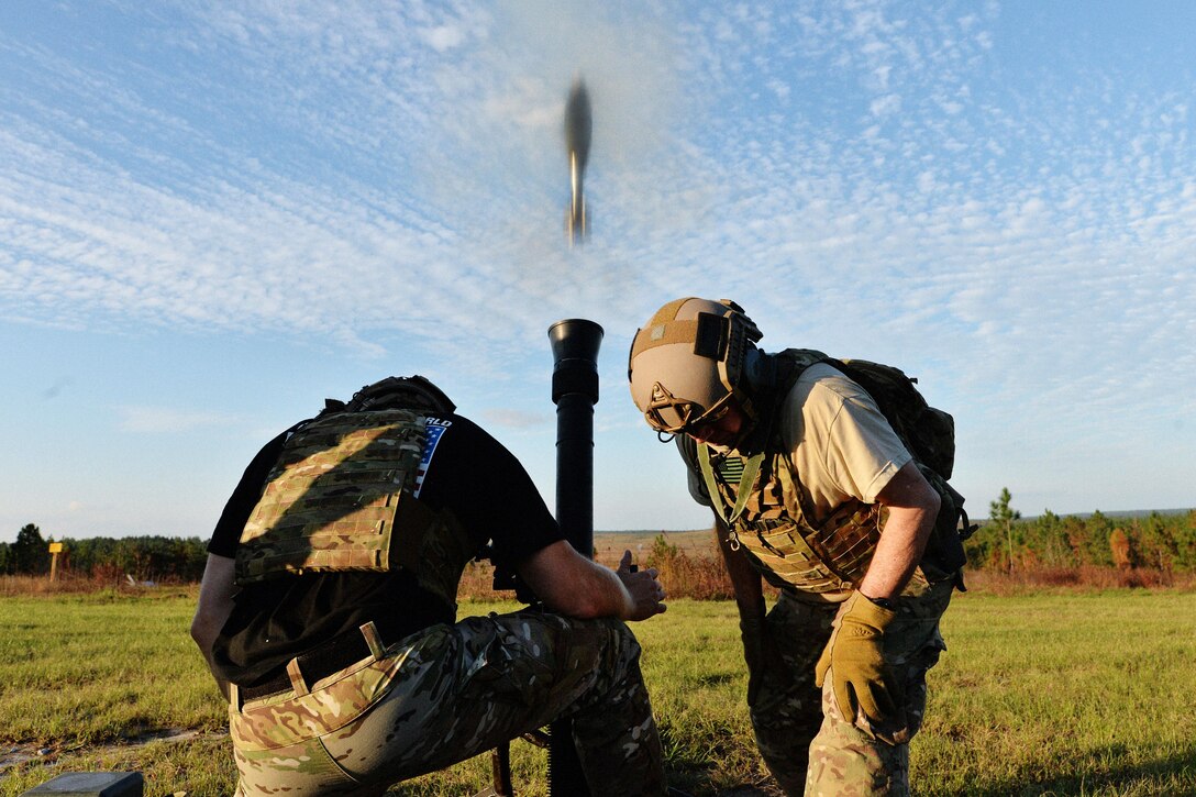 Army Green Berets fire a mortar system at training targets during Southern Strike 16 on Camp Shelby Joint Forces Training Center, Miss., Nov. 4, 2015. The soldiers are assigned to Company C, 2nd Battalion, 20th Special Forces Group. New York Air National Guard photo by Staff Sgt. Christopher S. Muncy