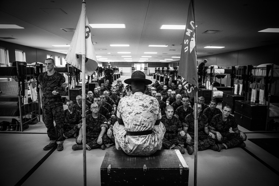 Sgt. Stephan G. Bacchus, senior drill instructor of Platoon 3004, India Company, 3rd Recruit Training Battalion, listens to his recruits’ explanation of leadership during a core values guided discussion Oct. 28, 2015, on Parris Island, S.C. Bacchus, 25, from East Stroudsburg, Pa., discussed with his recruits the importance of growing as a leader both in and out of the Marine Corps. Parris Island has been the site of Marine Corps recruit training since Nov. 1, 1915. Today, approximately 19,000 recruits come to Parris Island annually for the chance to become United States Marines by enduring 13 weeks of rigorous, transformative training. Parris Island is home to entry-level enlisted training for approximately 50 percent of males and 100 percent of females in the Marine Corps. (Photo by Lance Cpl. Aaron Bolser)