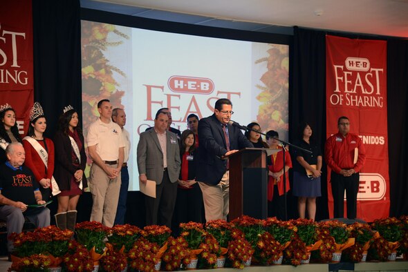 Members of the Del Rio community speak at the H-E-B Feast of Sharing at the Del Rio Civic Center in Del Rio, Texas, Nov. 14, 2015. The Feast of Sharing is the culmination of a year round commitment H-E-B makes to fighting hunger and includes music, arts and crafts, and kids’ activities. (U.S. Air Force photo by Airman 1st Class Brandon May)