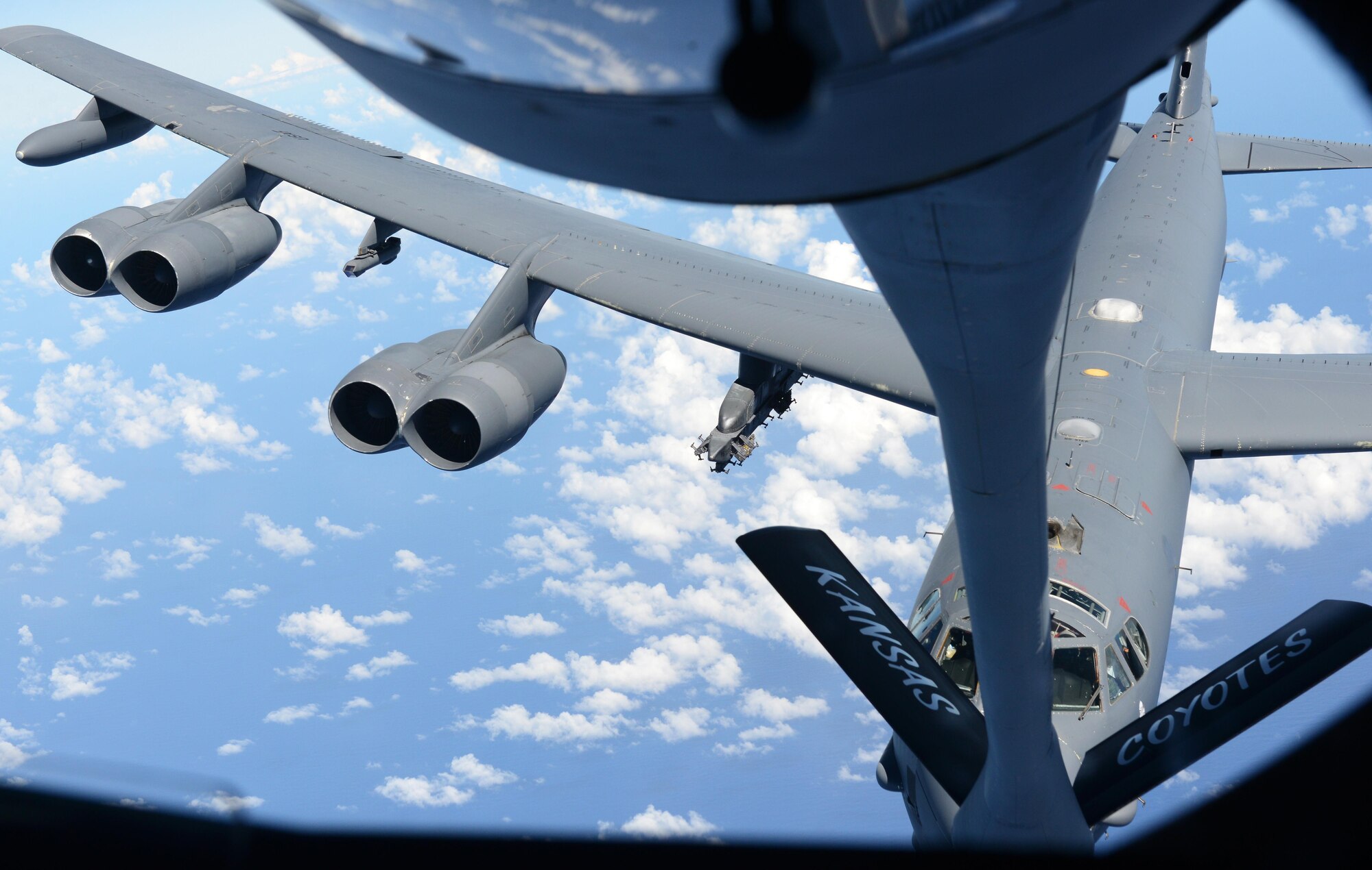 A U.S. Air Force B-52 Stratofortress connects to a KC-135 Stratotanker during an aerial refueling exercise Nov. 6, 2015, near Andersen Air Force Base, Guam. The B-52 crews are a part of the U.S. Pacific Command’s continuous bomber presence and support ongoing operations in the Indo- Asia-Pacific region. (U.S. Air Force photo by Airman 1st Class Arielle Vasquez/Released)