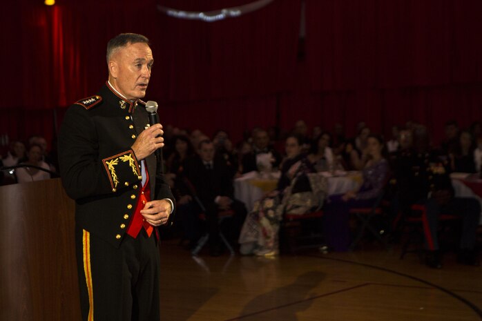 General Joseph F. Dunford, the Chairman of the Joint Chiefs of Staff, speaks to Marines, sailors, families and guests, during the 240th Marine Corps’ birthday ball held by the II Marine Expeditionary Force at Camp Lejeune, N.C., Nov. 7, 2015. Dunford reminisced about how some of his first memories during his time in the Marine Corps were formed at Camp Lejeune.