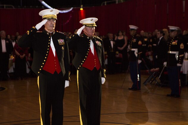General Joseph F. Dunford, the Chairman of the Joint Chiefs of Staff, and Maj. Gen. Walter L. Miller Jr., commanding general of II Marine Expeditionary Force, salute during honors for II MEF’s 240th Marine Corps birthday celebration at Camp Lejeune, N.C., Nov. 7, 2015. Dunford, the guest of honor for the ball, praised the Marines for their accomplishments during the past year, particularly operations in support of crises response and participation during Exercises African Lion, the largest U.S. military exercise on the continent of Africa, and Bold Alligator, the largest amphibious military exercise on the East Coast.