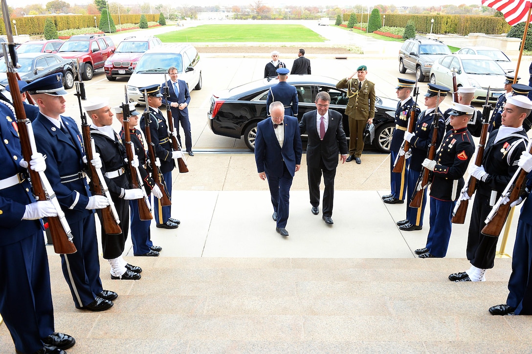 U.S. Defense Secretary Ash Carter, right, hosts an honor cordon to welcome Lithuanian Defense Minister Juozas Olekas to the Pentagon, Nov. 17, 2015. The two leaders met to discuss matters of mutual importance. DoD photo by Army Sgt. 1st Class Clydell Kinchen

