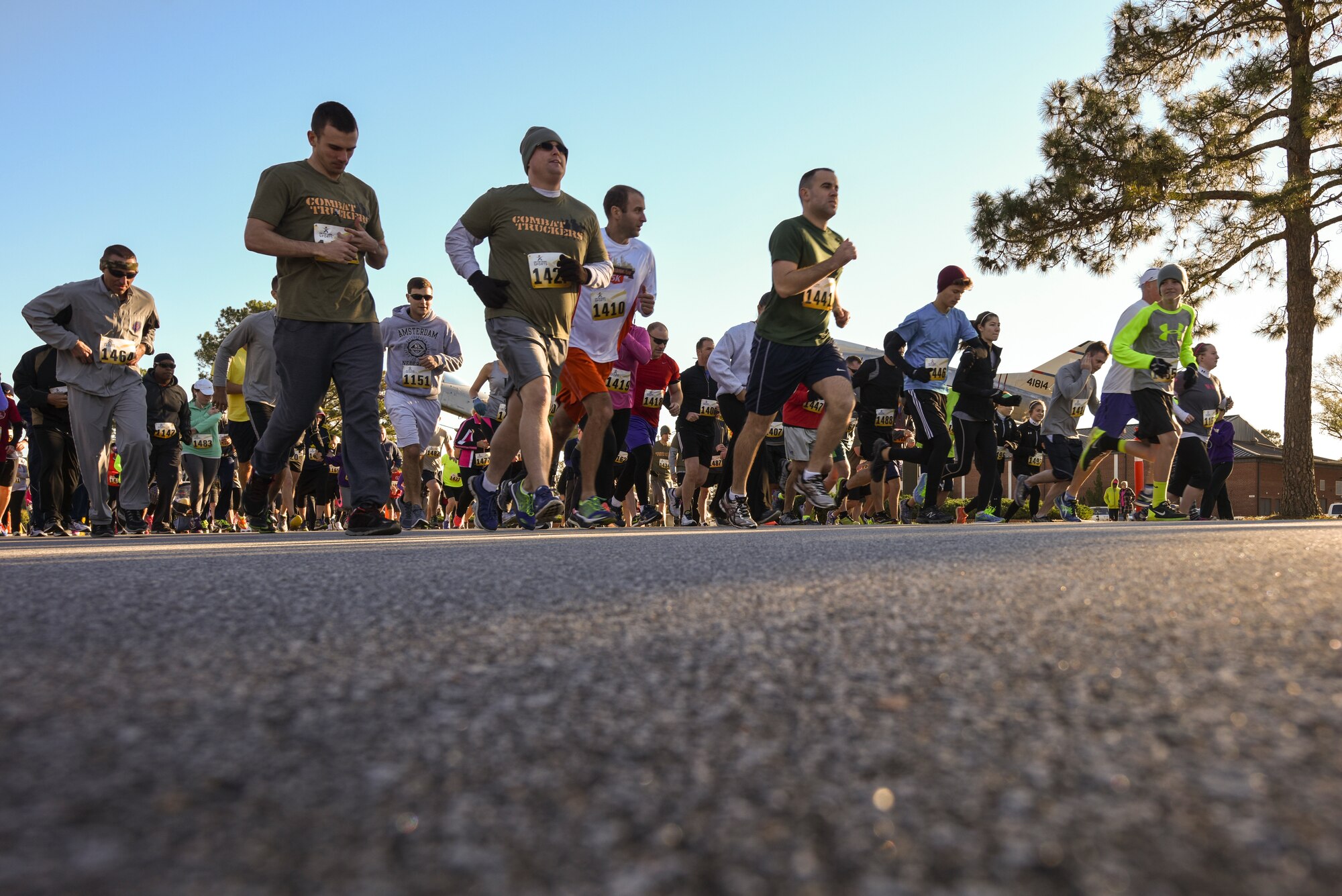 Runners begin the 5K portion of the Run for the Fallen Half-Marathon/5K, Nov. 14, 2015, at Seymour Johnson Air Force Base, North Carolina. More than 230 services members and civilians across the East Coast participated in the event. (U.S. Air Force photo/Airman Shawna L. Keyes)