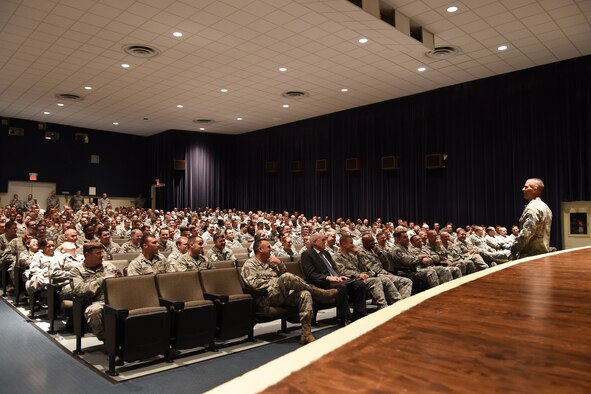 Chief Master Sgt. Steve McDonald, Air Combat Command command chief, addresses 4th Fighter Wing Airmen during an all-call, Nov. 13, 2015, at Seymour Johnson Air Force Base, North Carolina. McDonald responded to questions regarding changes to the promotions, enlisted evaluations and proposed changes to military retirement plans. (U.S. Air Force photo/Senior Airman Aaron J. Jenne)
