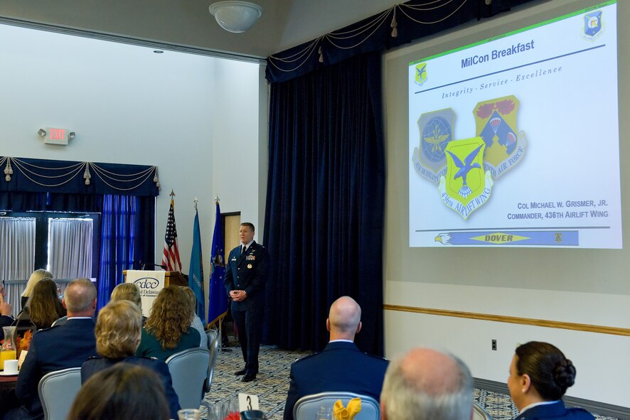 Col. Michael Grismer, 436th Airlift Wing commander, briefs Delaware Governor Jack Markell, U.S. congressional delegates from Delaware, Central Delaware Chamber of Commerce members, local civic and business leaders and Team Dover members at the 2015 Military Construction breakfast Nov. 9, 2015, at The Landings on Dover Air Force Base, Del. The annual MilCon breakfast and briefing was hosted by the CDCC and informed attendees on current and future construction projects at the base, community partnership initiatives and the impact that Team Dover has on the state and local economies. (U.S. Air Force photo/Roland Balik)