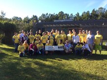 52 members of Joint Base Charleston pose for a group photo at Fort Dorchester High School, S.C., during this year’s United Way Day of Caring on Nov. 13, 2015. The team, which was joined by 200 local Junior Reserve Officer’s Training Corps students, built retaining walls, installed pathways and cleaned up three courtyards for students to enjoy. (U.S. Air Force photo / Tech Sgt. Renae Pittman)