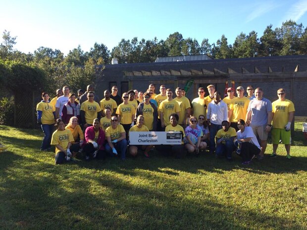 52 members of Joint Base Charleston pose for a group photo at Fort Dorchester High School, S.C., during this year’s United Way Day of Caring on Nov. 13, 2015. The team, which was joined by 200 local Junior Reserve Officer’s Training Corps students, built retaining walls, installed pathways and cleaned up three courtyards for students to enjoy. (U.S. Air Force photo / Tech Sgt. Renae Pittman)