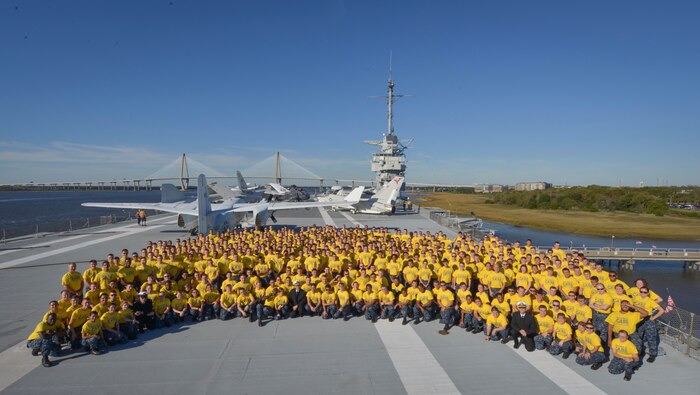 Sailors assigned to Naval Nuclear Power Training Command on Joint Base Charleston Weapons Station pose for a photo aboard USS YORKTOWN (CV-10) at Patriot’s Pointe Naval and Maritime Museum in Mount Pleasant, S.C., Nov. 13, 2015. More than 3,500 NNPTC staff and students volunteered during the 2015 Trident United Way Day of Caring. (U.S. Navy photo by Mass Communication Specialist 2nd Class Jason Pastrick / Released).