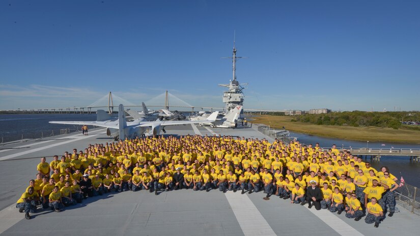 Sailors assigned to Naval Nuclear Power Training Command on Joint Base Charleston Weapons Station pose for a photo aboard USS YORKTOWN (CV-10) at Patriot’s Pointe Naval and Maritime Museum in Mount Pleasant, S.C., Nov. 13, 2015. More than 3,500 NNPTC staff and students volunteered during the 2015 Trident United Way Day of Caring. (U.S. Navy photo by Mass Communication Specialist 2nd Class Jason Pastrick / Released).