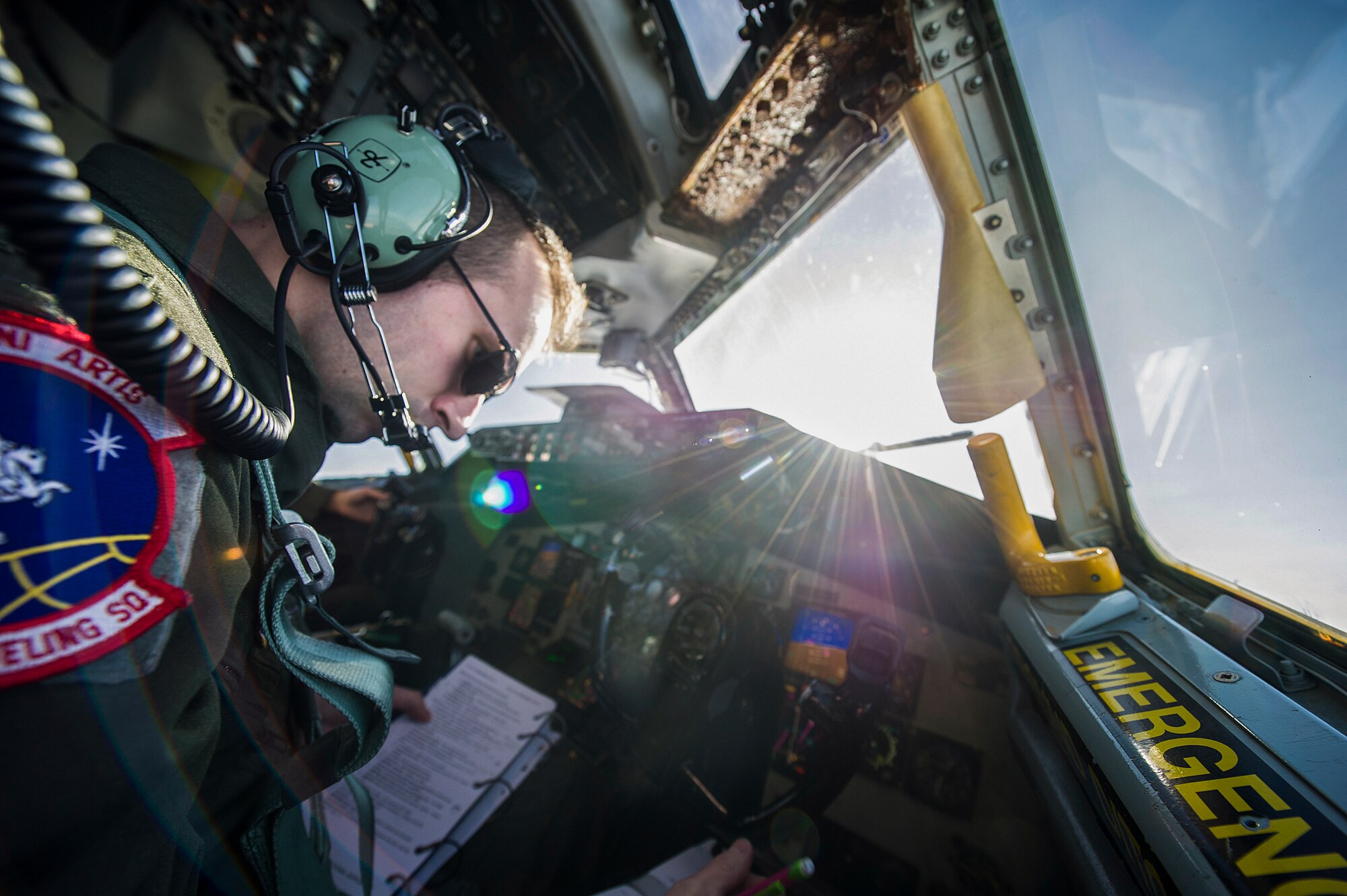 1st Lt. Steven Strickland, 93rd Air Refueling Squadron co-pilot, sits in the co-pilot seat during an air refueling mission over Oregon Nov. 16, 2015. This refueling mission was Strickland’s first mission for Fairchild Air Force Base. (U.S. Air Force Photo/ Airman 1st Class Sean Campbell)