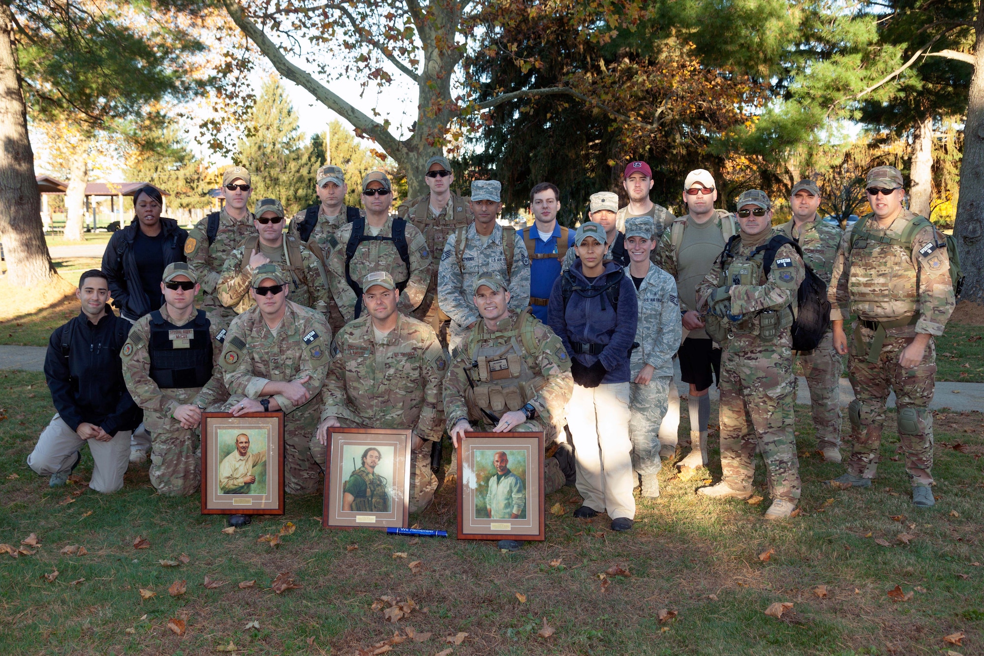 151030-F-ZZZ999-022.jpg

Members of the Air Force Office of Special Investigations (OSI), U.S. Air Force Special Investigations Academy Detachment 1 pose for a group photo prior to the Annual 11 Mile Memorial Ruck March Oct. 30, 2015, at Joint Base McGuire-Dix-Lakehurst, N.J. The event was held in memory of OSI Agents David Wieger, Nathan Schuldeiss and Thomas Crowell who made the ultimate sacrifice in an IED attack on Nov. 1, 2007, while conducting counter threat operations in Iraq. (U.S. Air Force photo by Joseph Sharp/Released)
