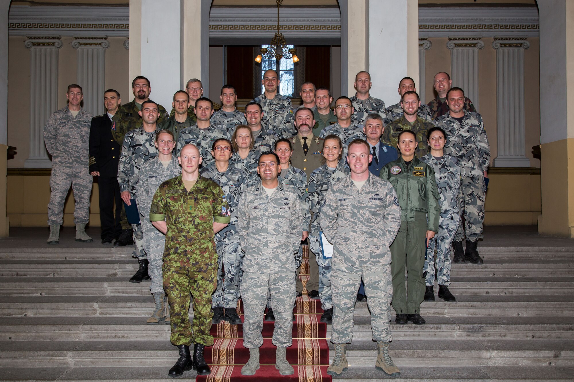 Students and instructors pose for a photo after graduation from the first ever IEAFA combined international officer and NCO PME course in Sofia, Bulgaria, Nov. 13, 2015.  Twenty-three students from Bulgaria, Czech Republic, Estonia, and Hungary participated in the inaugural course. (U.S. Air Force photo/SMSgt Travis Robbins/Released)