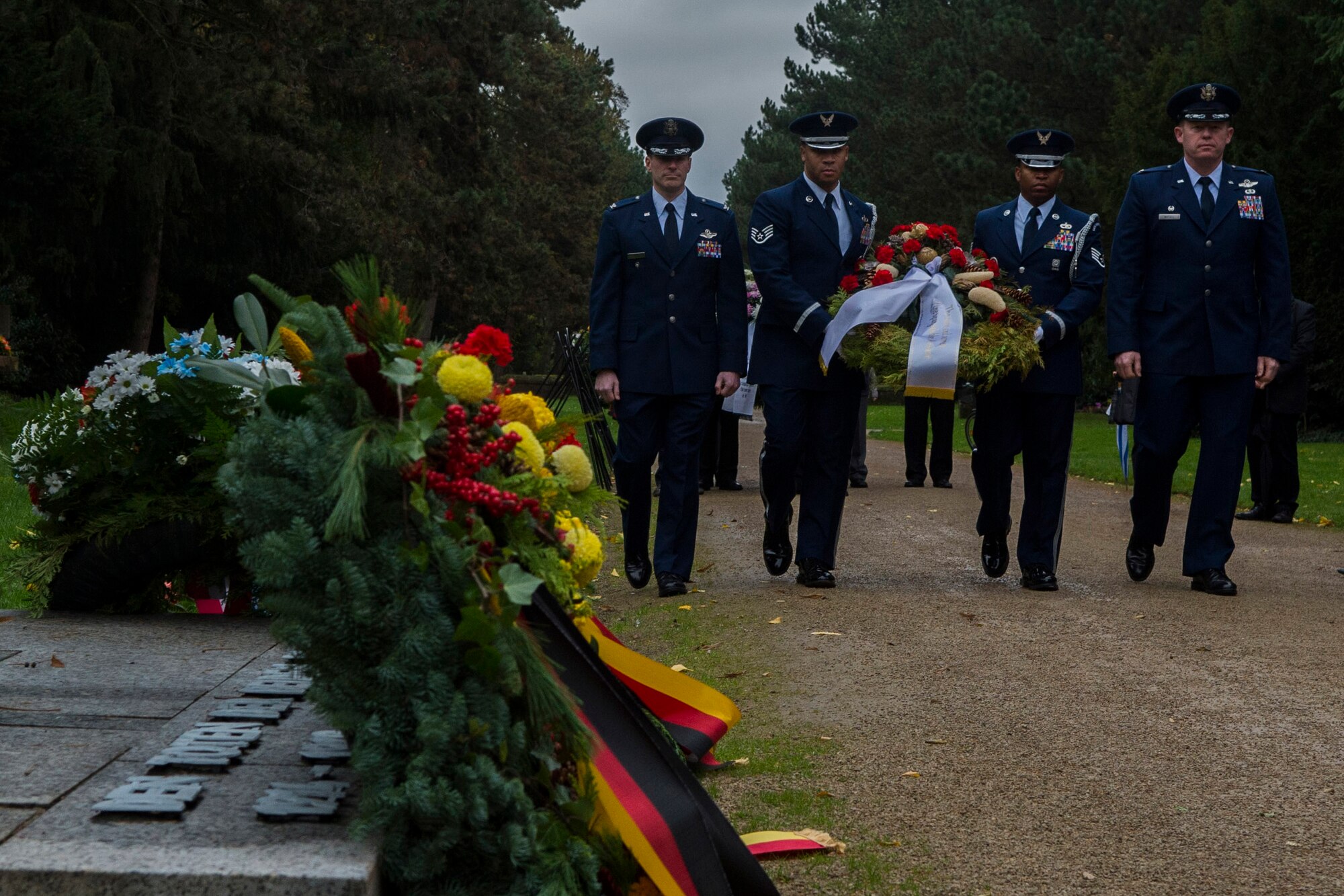 Spangdahlem Airmen prepare to lay a wreath during a National Mourning Day ceremony at a cemetery in Trier, Germany, Nov. 15, 2015. Germany’s National Mourning Day is day for mourning the victims of the two world wars, those who lost their lives during current operations, and ones still missing in action. (U.S. Air Force photo by Airman 1st Class Luke Kitterman/Released)
